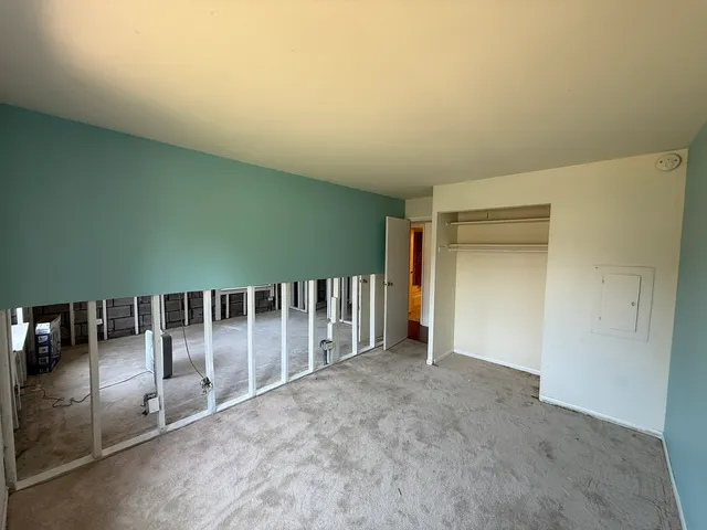 an empty room with windows