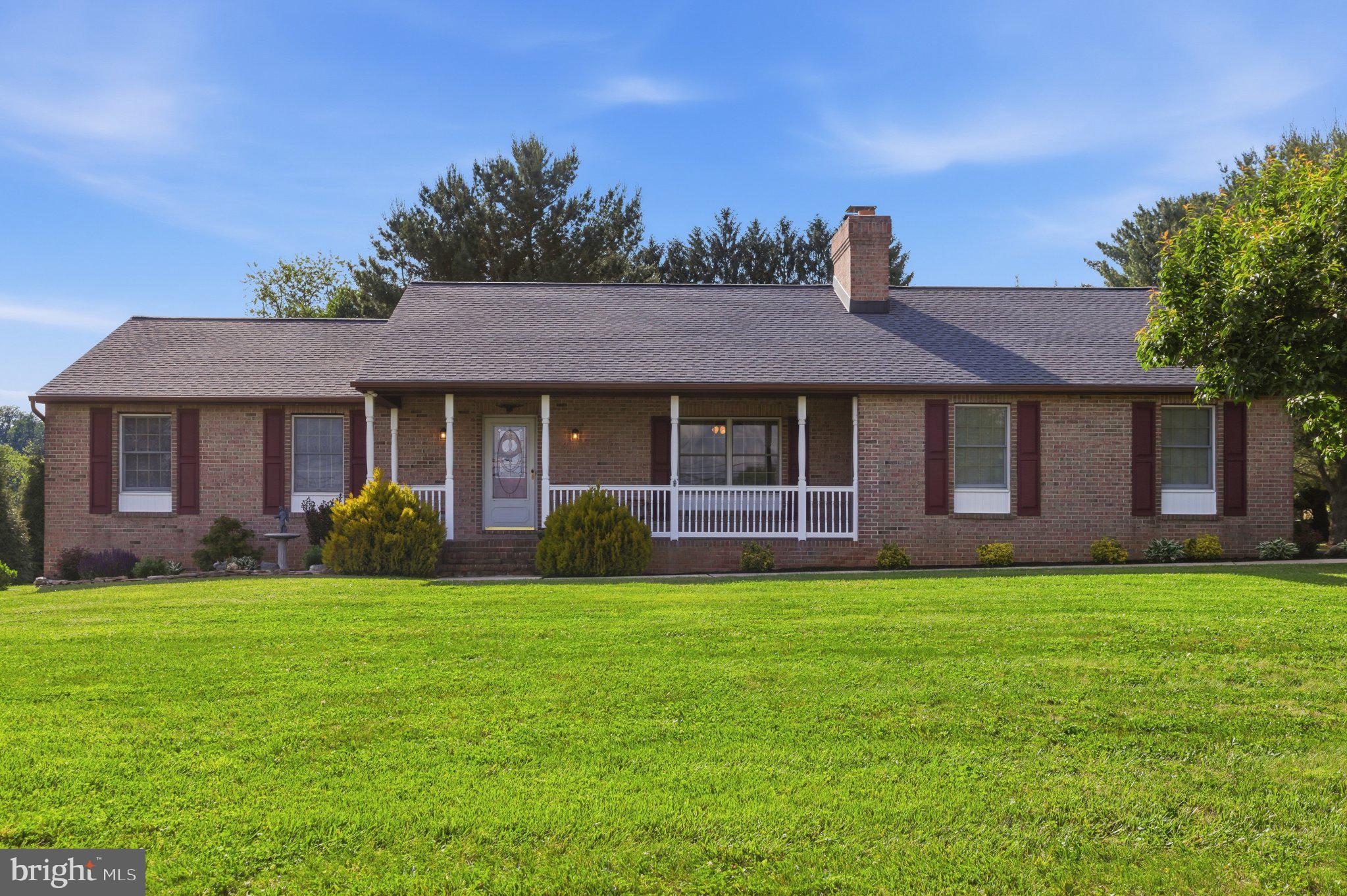 18310 Upper Beckleysville Road Hampstead, MD 21074 - Photo 4 of 67 Charming brick home with lush lawn.
