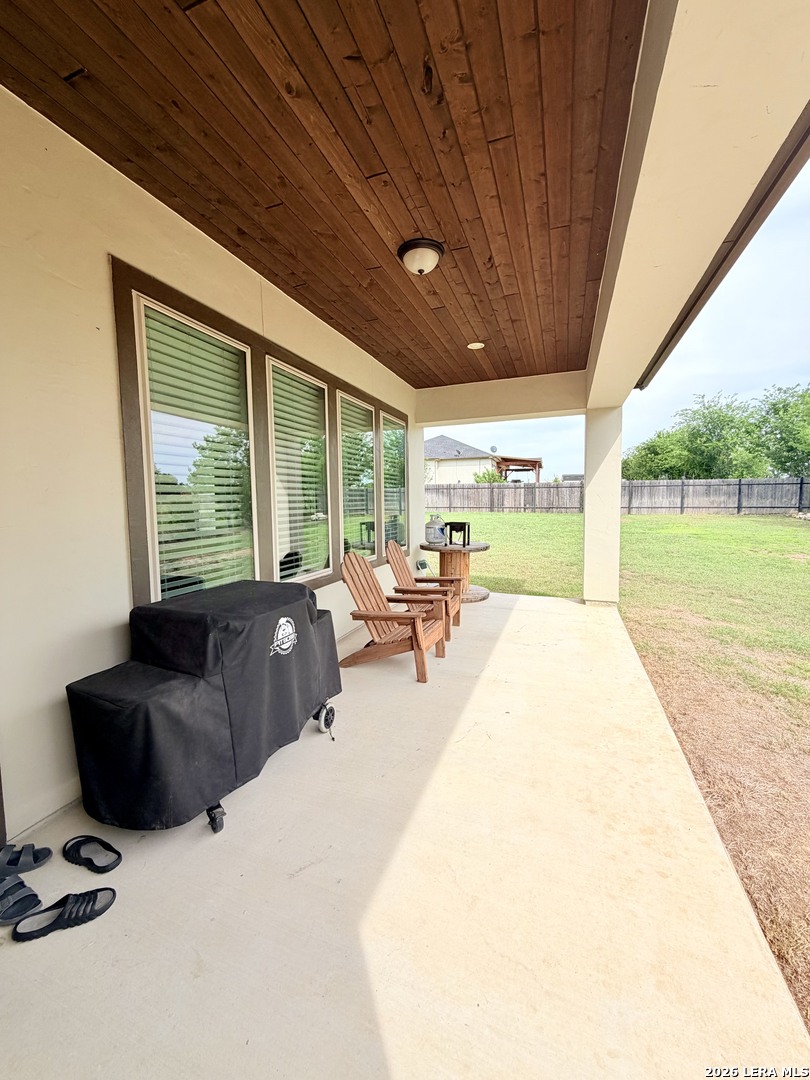 615 Abbott Ridge Converse, TX 78109 - Photo 26 of 26 a living room with furniture and a large window