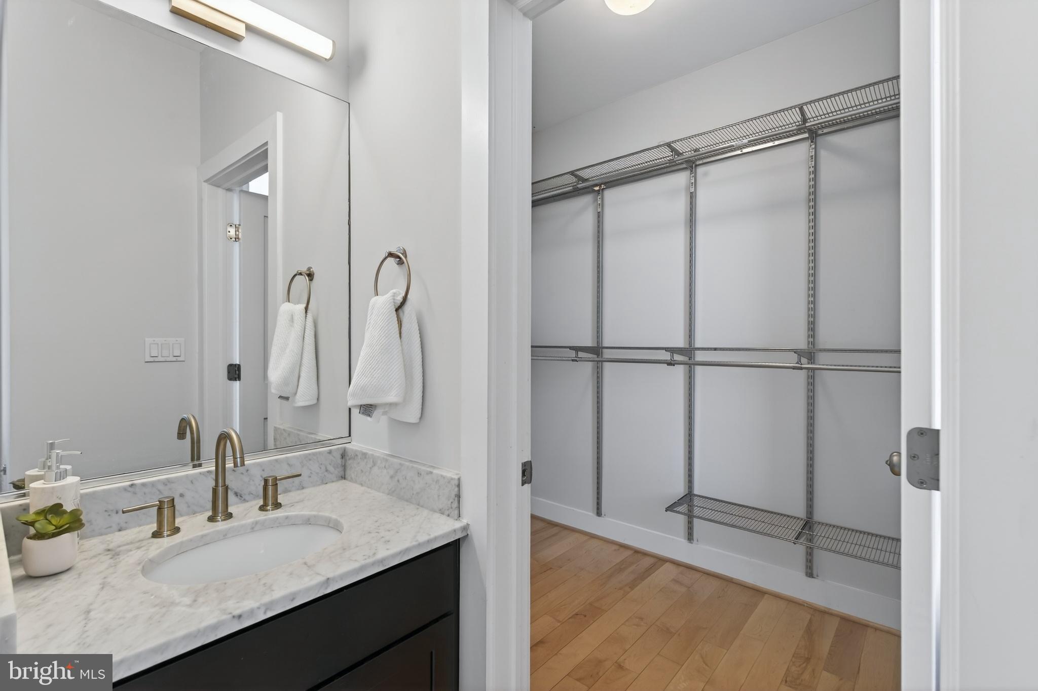 751 P Street Northwest, Unit 2 Washington, DC 20001 - Photo 24 of 39 Walk-In Closet and Bathroom