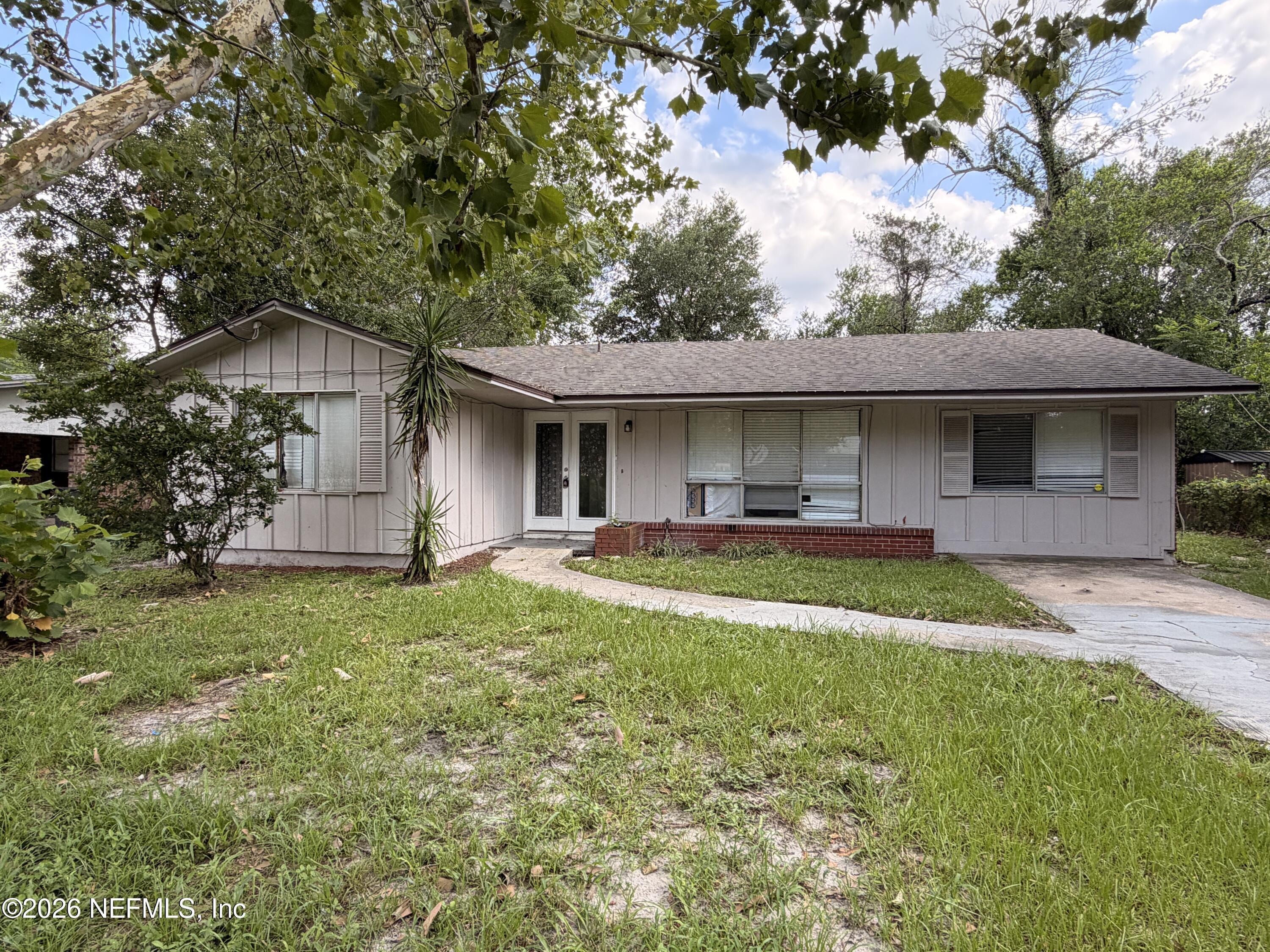 7552 Wheat Road Jacksonville, FL 32244 - Photo 1 of 14 1_Front of Home