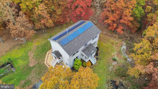 view of a house with a yard