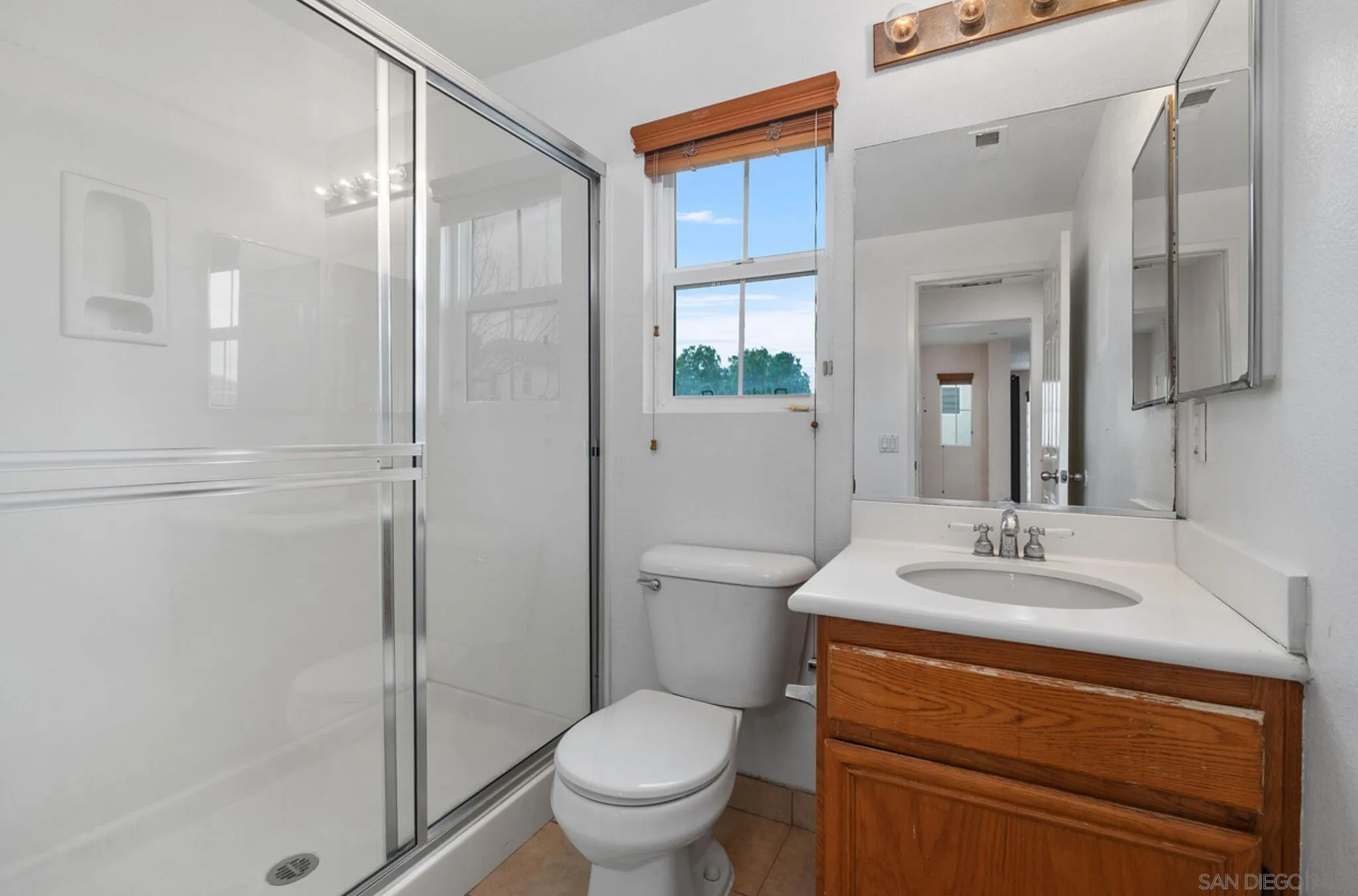 2269 Pointe Parkway Spring Valley, CA 91978 - Photo 19 of 35 a bathroom with a sink toilet and shower