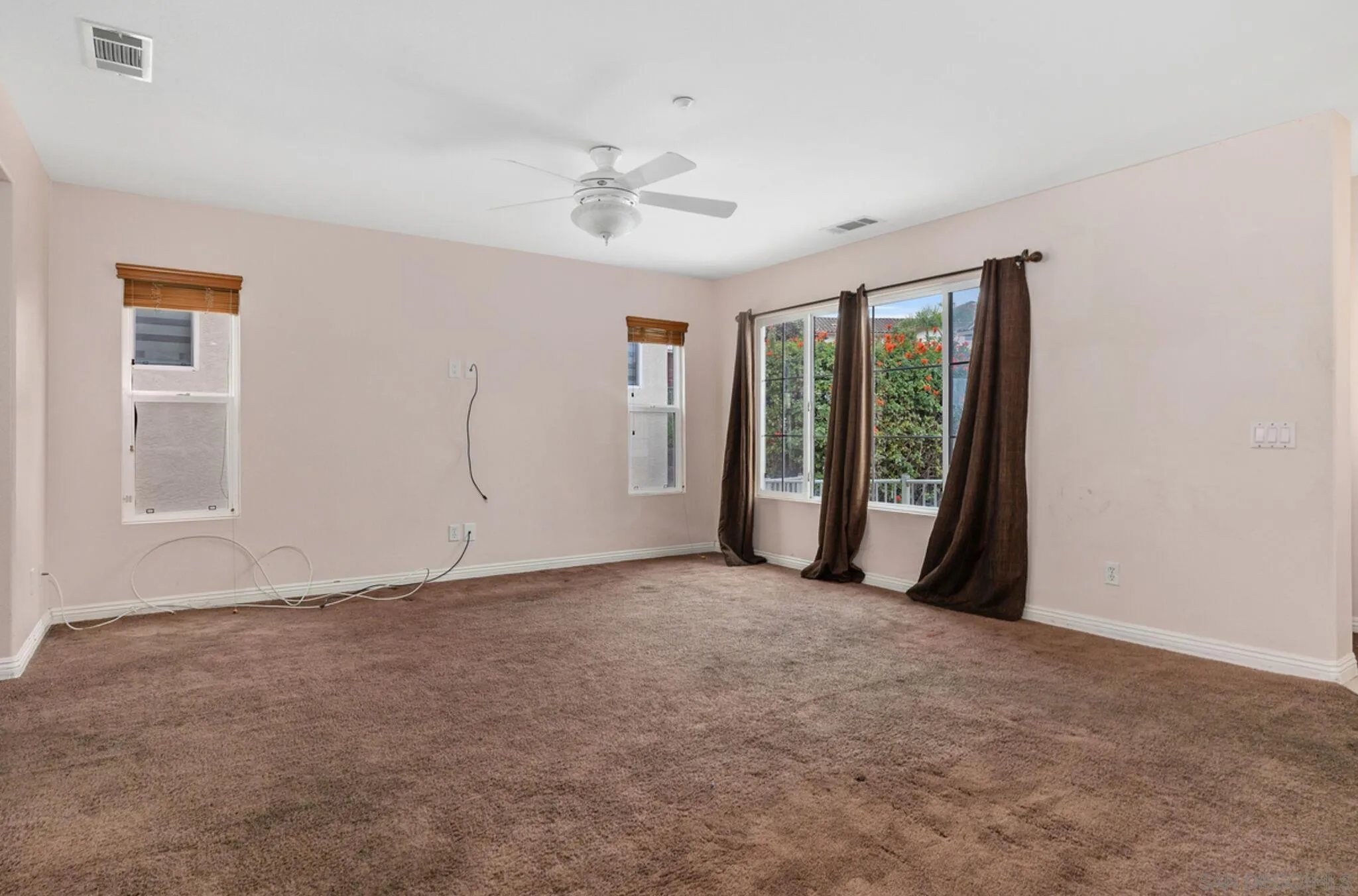 2269 Pointe Parkway Spring Valley, CA 91978 - Photo 4 of 35 an empty room with windows and closet
