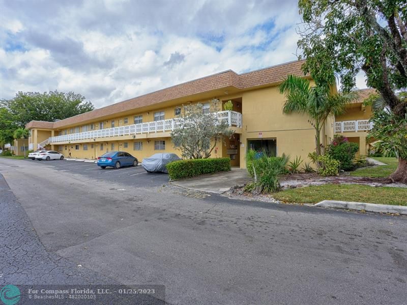 5160 Southwest 40th Avenue, Unit 29D Dania Beach, FL 33314 - Photo 25 of 31 a view of a house with outdoor space and a street