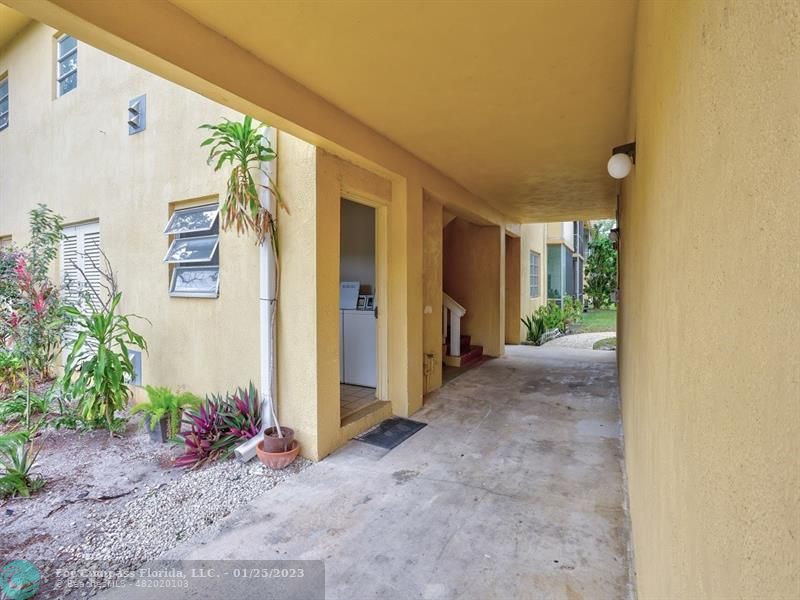 5160 Southwest 40th Avenue, Unit 29D Dania Beach, FL 33314 - Photo 26 of 31 a view of a house with a backyard