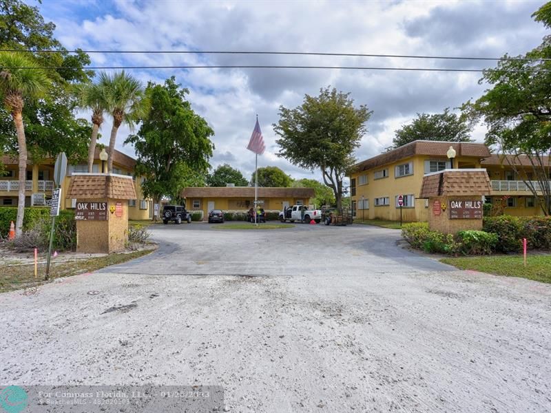 5160 Southwest 40th Avenue, Unit 29D Dania Beach, FL 33314 - Photo 27 of 31 a car parked on the side of the road