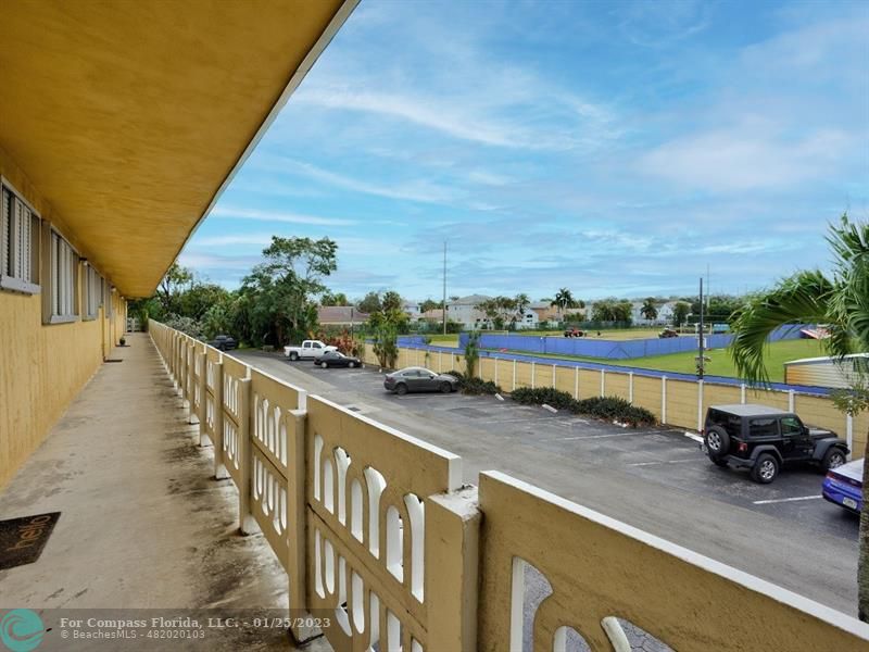 5160 Southwest 40th Avenue, Unit 29D Dania Beach, FL 33314 - Photo 4 of 31 a view of car parked on the street