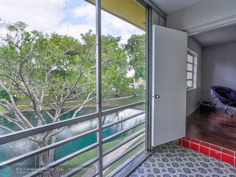 5160 Southwest 40th Avenue, Unit 29D Dania Beach, FL 33314 - Photo 10 of 31 a view of a balcony with an outdoor space