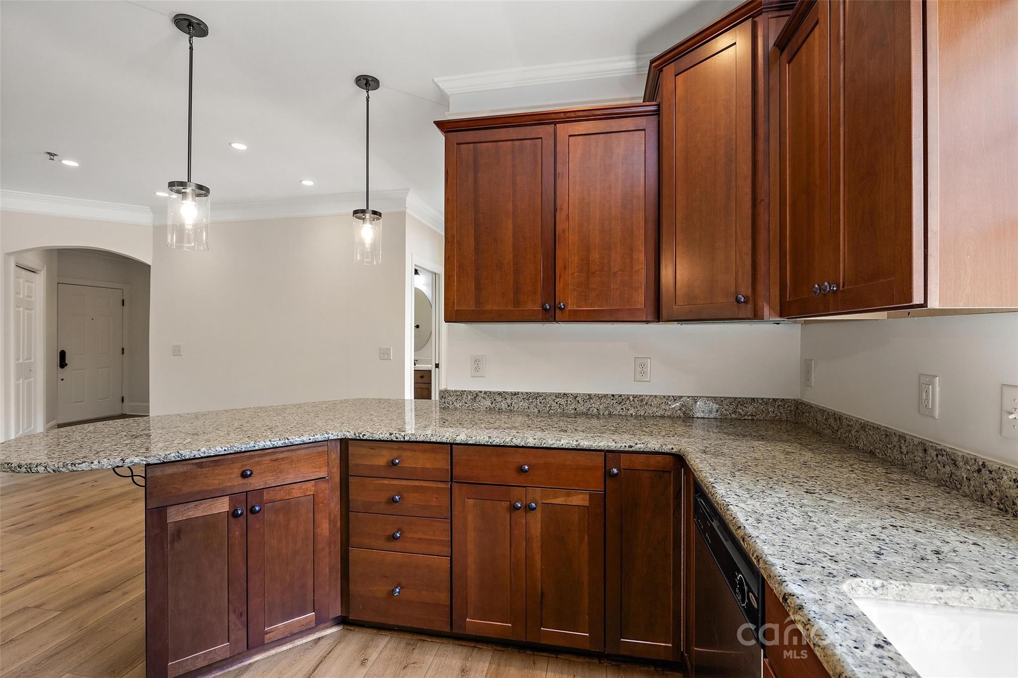180 Gateway Drive Boone, NC 28607 - Photo 6 of 13 a kitchen with granite countertop a sink cabinets and stainless steel appliances