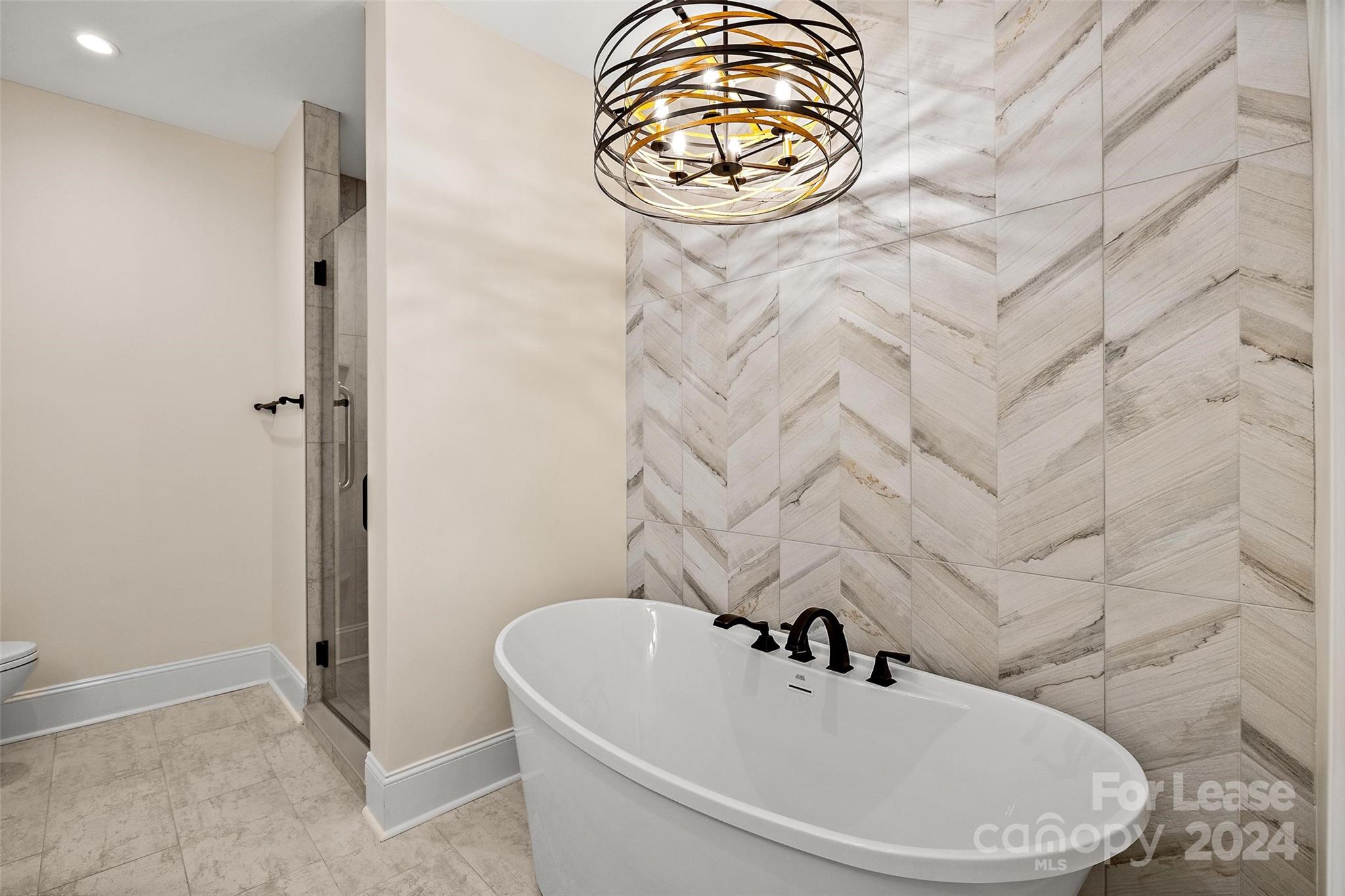 180 Gateway Drive Boone, NC 28607 - Photo 9 of 13 a bathroom with a sink and a tub