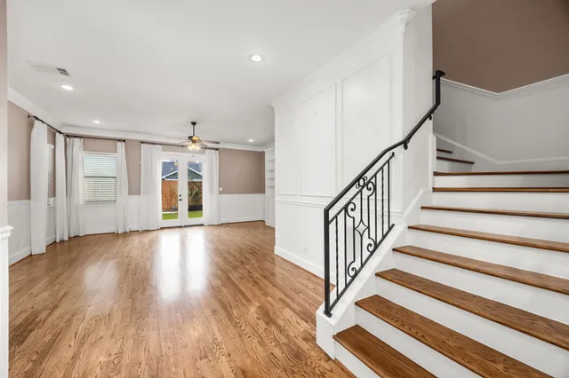 a view of entryway with wooden floor