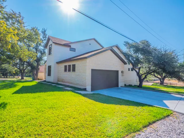 a view of backyard of house