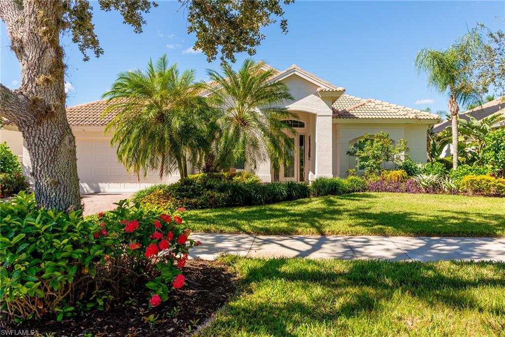 Gorgeous single-family home in Lely Resort, with four bedrooms and three bathrooms!