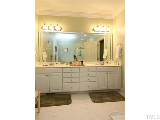 3404 Sir Colleton Court Raleigh, NC 27612 - Photo 15 of 25 Master bath featuring dual vanities and tile floors. Master Bath/Spa