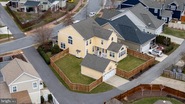an aerial view of a city with lots of residential buildings