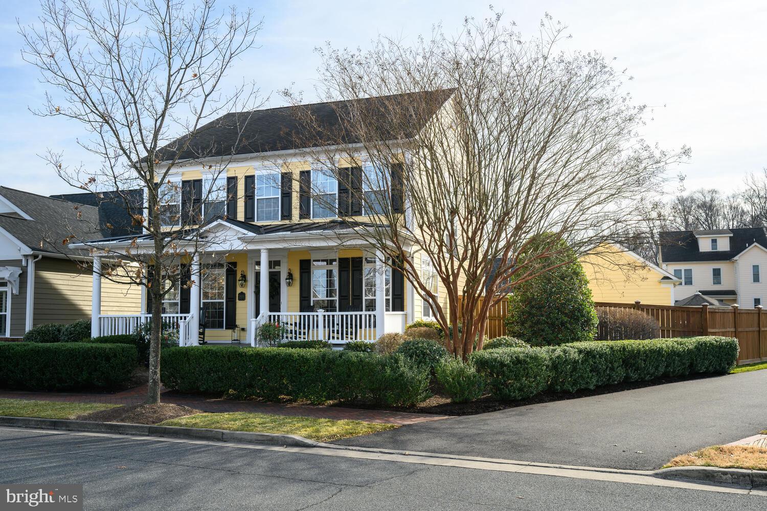 28241 Knapps Easton, MD 21601 - Photo 16 of 69 a view of a white building among the street with palm trees