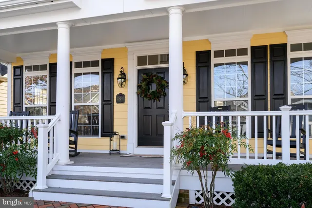 a living room with furniture fireplace and a flat screen tv