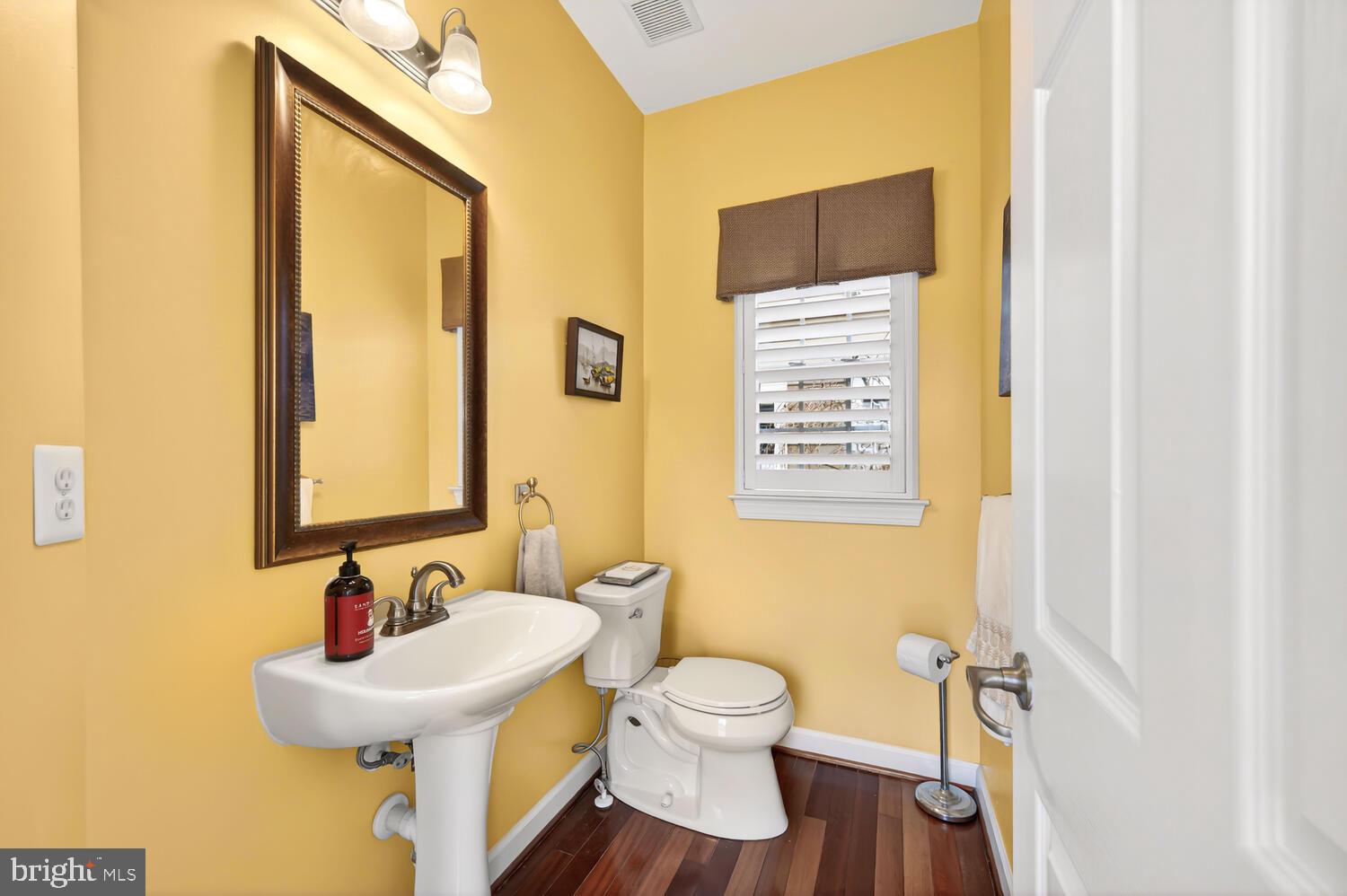 28241 Knapps Easton, MD 21601 - Photo 39 of 69 a bathroom with a sink and a mirror