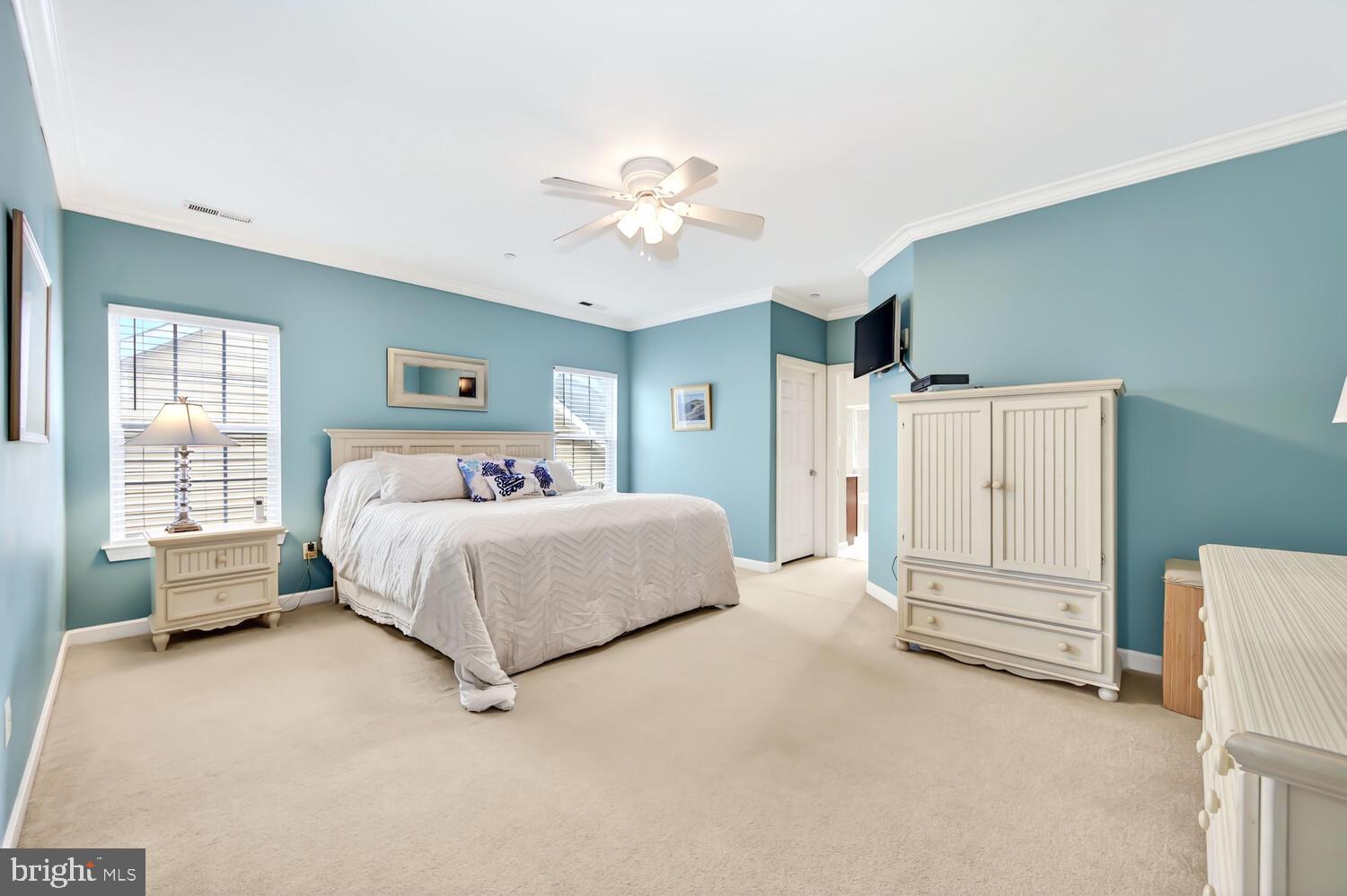 28241 Knapps Easton, MD 21601 - Photo 49 of 69 a bedroom with a bed dresser and a window