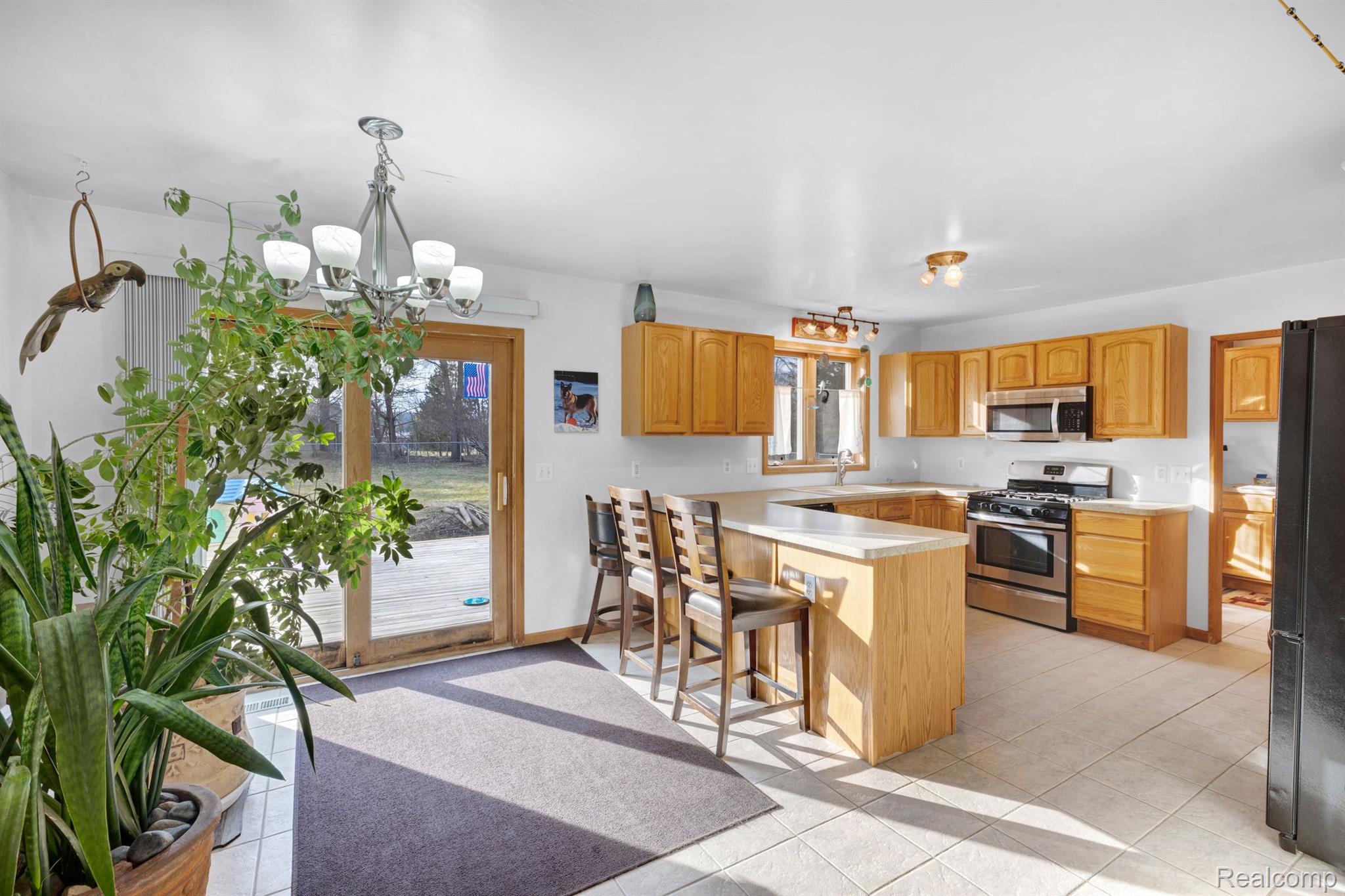 2741 Wixom Road Milford, MI 48381 - Photo 5 of 32 Breakfast Nookw/doorwall to deck