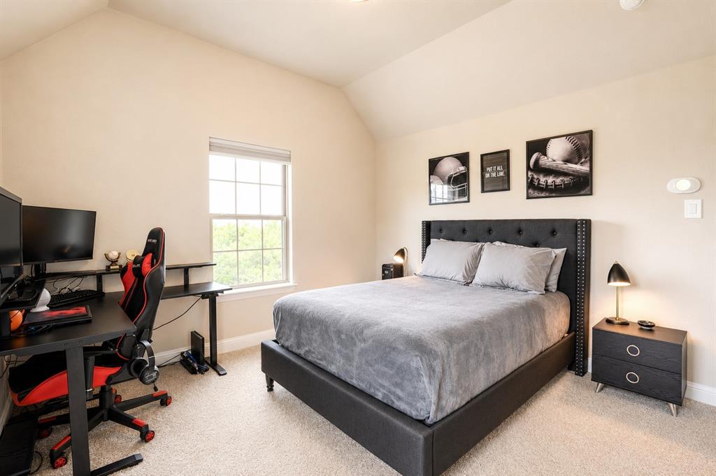 25 Morrison Road Howe, TX 75459 - Photo 22 of 27 Carpeted bedroom featuring vaulted ceilings, a window with exterior views, and a neutral color palette