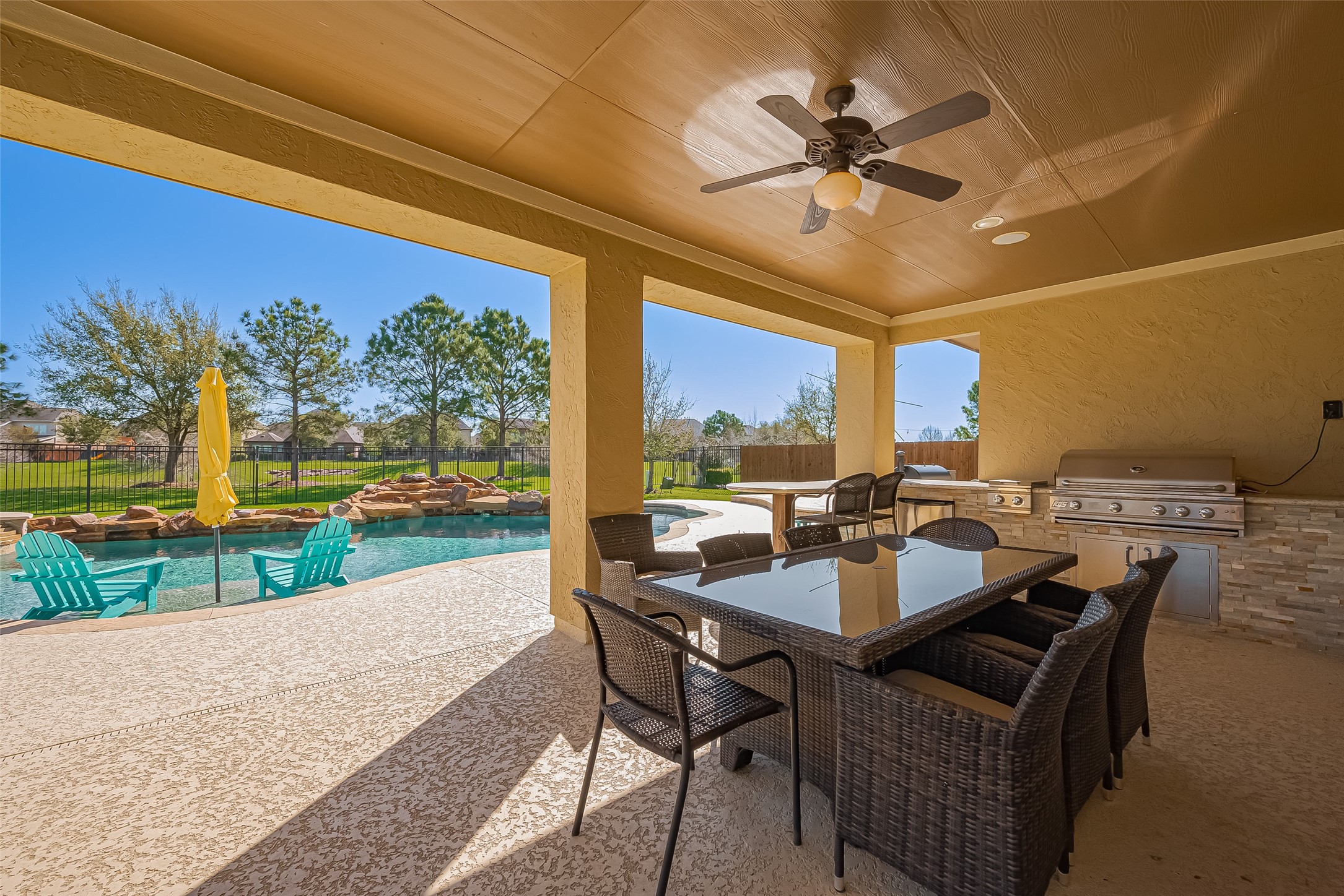 10018 Durango Path Lane Cypress, TX 77433 - Photo 46 of 50 Elegant covered patio perfect for outdoor entertaining by the pool.