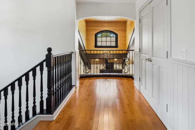 a view of a entryway door with wooden floor