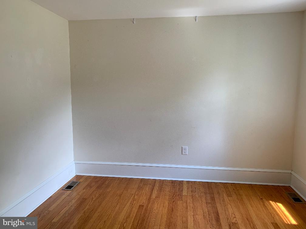 223 Dickinson Road Glassboro, NJ 08028 - Photo 6 of 10 a view of room with wooden floor