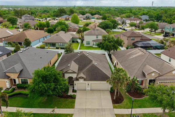 a view of a swimming pool and a yard