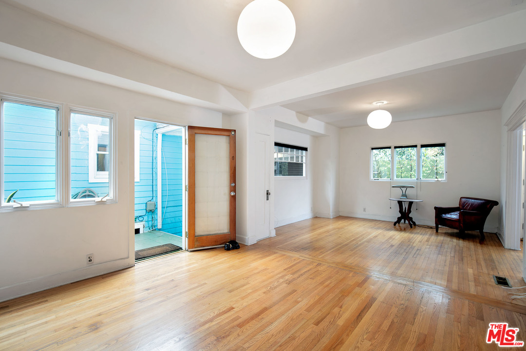 805 Hampton Drive Venice, CA 90291 - Photo 22 of 27 a view of empty room with wooden floor and fan