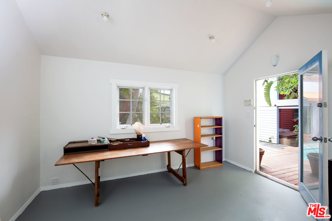 805 Hampton Drive Venice, CA 90291 - Photo 10 of 27 a living room with furniture and a window