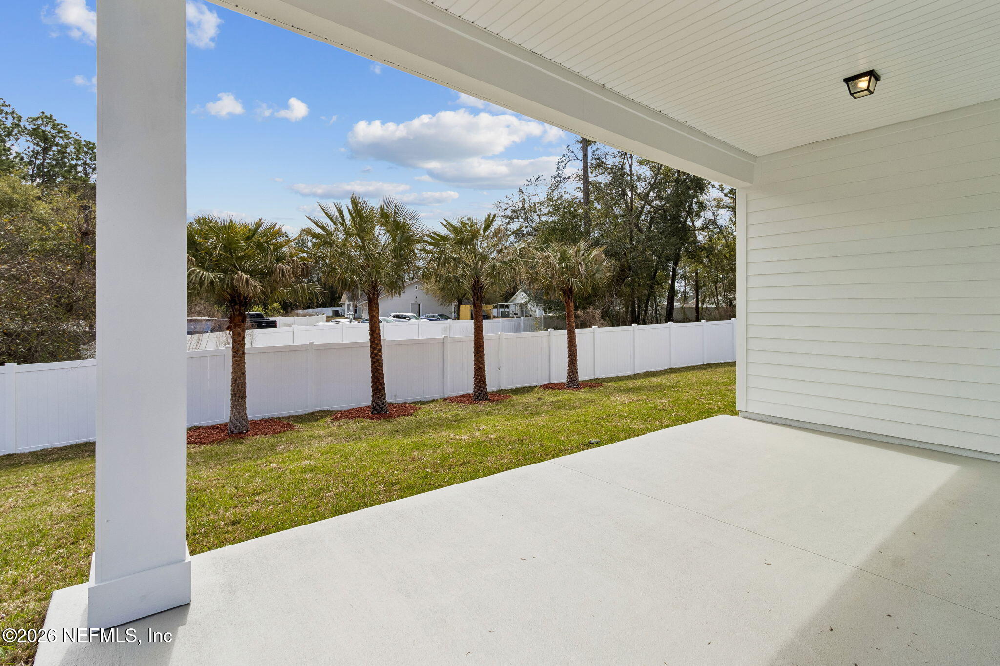 85148 Sandy Rdg Loop, Unit 17 Yulee, FL 32097 - Photo 22 of 25 Back yard