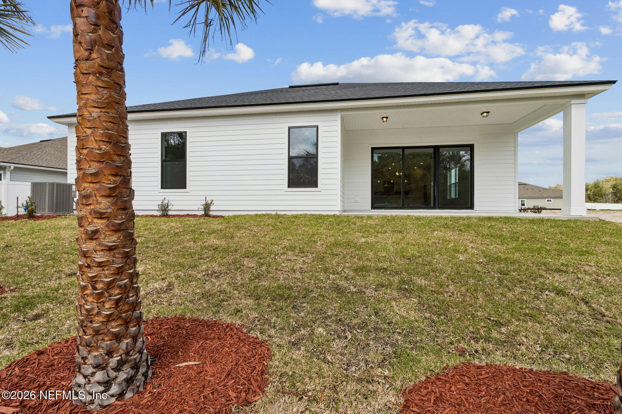 85148 Sandy Rdg Loop, Unit 17 Yulee, FL 32097 - Photo 23 of 25 Back of house