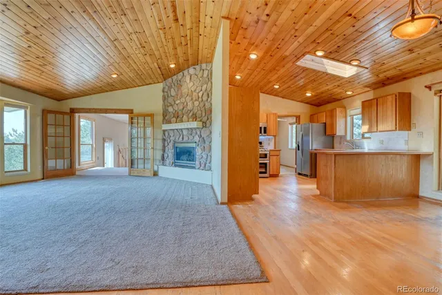 a view of livingroom with kitchen