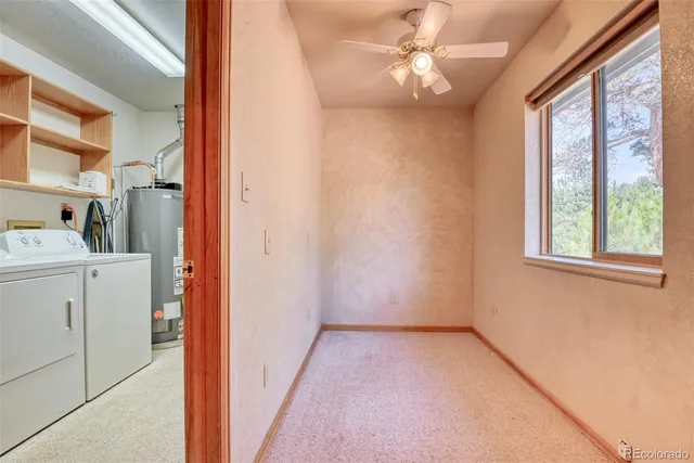 a view of a hallway with a window