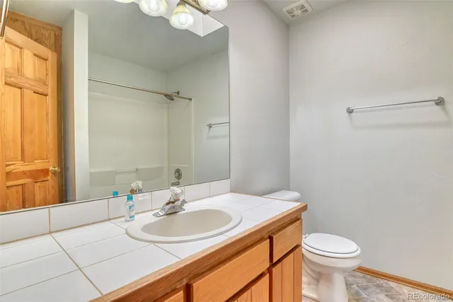 a bathroom with a sink and a toilet