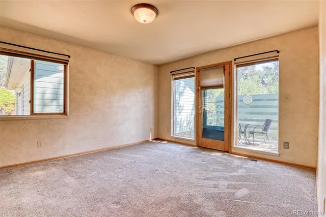 an empty room with windows