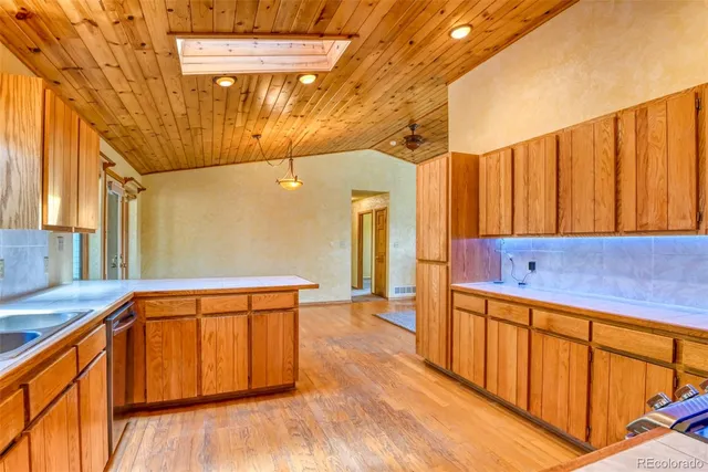 a hallway with wooden door