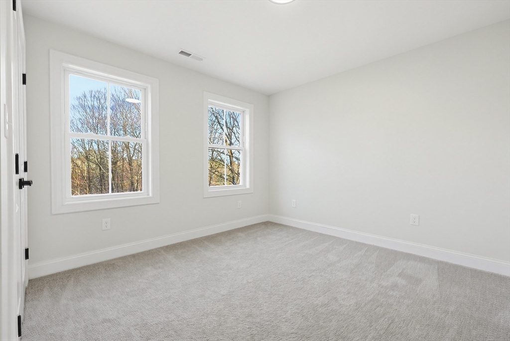 673 Pleasant Street Leicester, MA 01542 - Photo 34 of 38 an empty room with windows