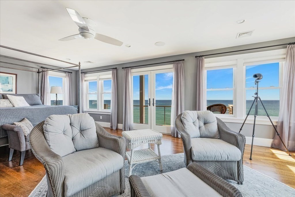 12 Monitor Road Marshfield, MA 02050 - Photo 22 of 42 a living room with furniture and a fireplace