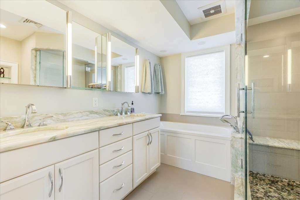 12 Monitor Road Marshfield, MA 02050 - Photo 24 of 42 a bathroom with a granite countertop sink mirror and double