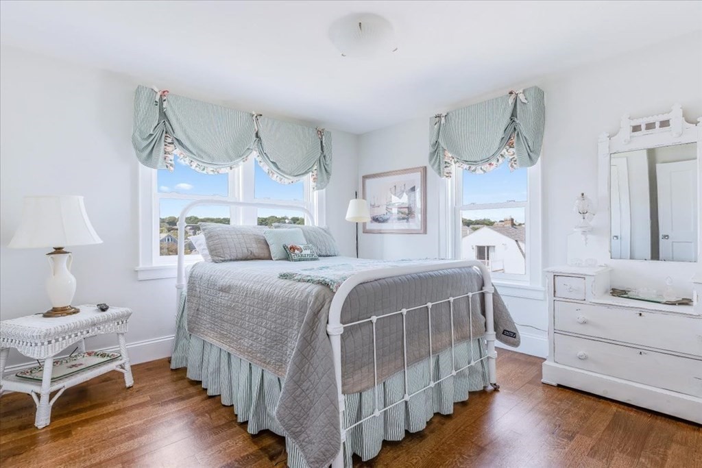 12 Monitor Road Marshfield, MA 02050 - Photo 26 of 42 a bedroom with bed and wooden floor