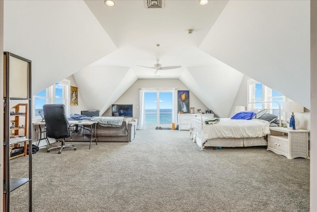 12 Monitor Road Marshfield, MA 02050 - Photo 29 of 42 a living room with furniture and a chandelier