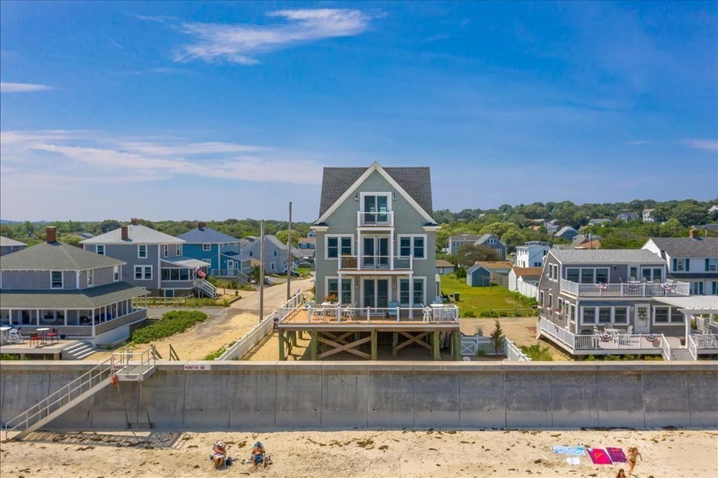 12 Monitor Road Marshfield, MA 02050 - Photo 3 of 42 a view of a swimming pool with a patio