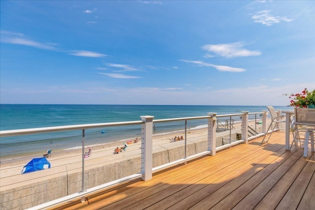 12 Monitor Road Marshfield, MA 02050 - Photo 32 of 42 a view of ocean from a balcony