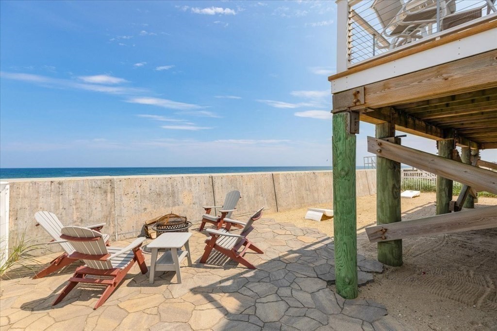 12 Monitor Road Marshfield, MA 02050 - Photo 35 of 42 a view of a patio with table and chairs