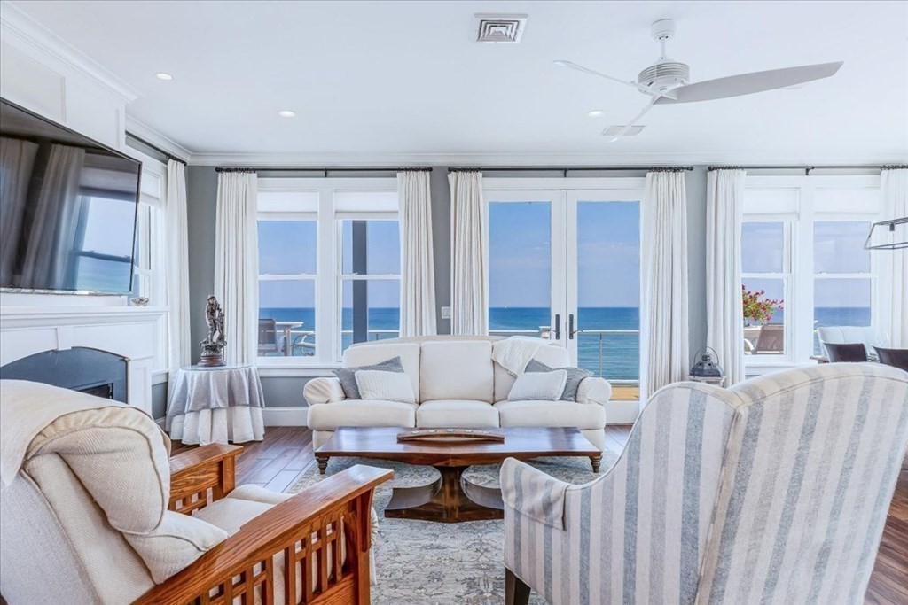 12 Monitor Road Marshfield, MA 02050 - Photo 6 of 42 a living room with furniture fireplace and a large window