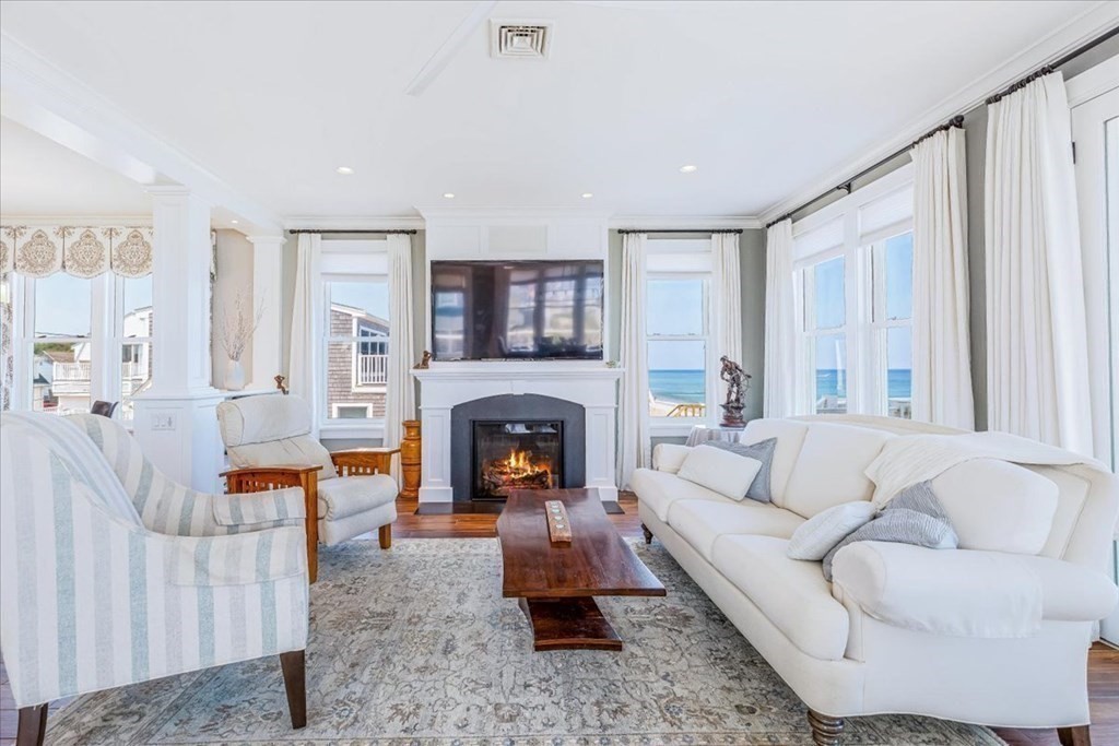 12 Monitor Road Marshfield, MA 02050 - Photo 7 of 42 a living room with furniture and a fireplace