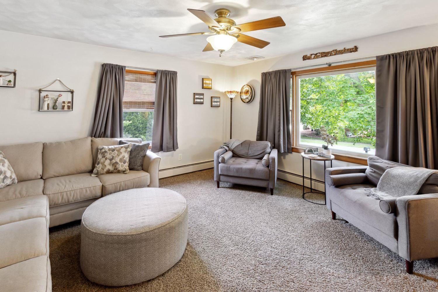 1205 Robin Road Dixon, IL 61021 - Photo 8 of 29 a living room with furniture and a large window